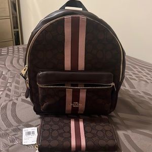 Small Coach backpack. Never worn and it comes with the matching wallet.